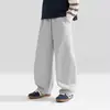 Pantalones deportivos para niños Zuoxi otoño pantalones de niño primavera y otoño 2026 nuevos pantalones curvos elegantes para niños mayores