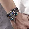Amazon Más Vendido Transfronterizo Estilo Retro Cuerda Elástica Multicapa Tejido a Mano Sombrero de Vaquero Pluma Pulsera de Cuero para Hombre