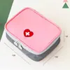 Bolsa médica portátil para viagens de negócios na Coreia, ideal para primeiros socorros, com formato de coração e design compacto. Perfeita para guardar medicamentos e outros remédios.