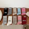 Meias de lã de coelho ovo femininas outono e inverno espessadas Coreia do Sul Dongdaemun Ins Cloth Label meias quentes de cano médio empilhadas para crianças