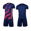 Venta al por mayor del fabricante Traje de uniforme de fútbol para hombre y mujer Ropa de entrenamiento de manga corta para competición Ropa para niños Versión en blanco Camiseta deportiva Impresión de número