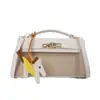Bolso de mano cuadrado pequeño de moda transfronterizo para mujer, nuevo bolso Kelly de gamuza de nicho vintage 2026, bolso cruzado simple para el día a día