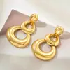 Amazon aretes dorados retro gota de agua mujer círculo geométrico INS nicho personalidad exagerada aretes al por mayor