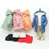 Inverno novas roupas acolchoadas de algodão infantil roupas acolchoadas de algodão médio e longo para meninos e meninas Versão coreana de casaco jaqueta acolchoado de algodão com capuz grosso atacado
