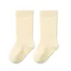 Calcetines para bebé, nuevo modelo de invierno, color liso, forrados de felpa, engrosados, calcetines cálidos, puño ancho, sin costuras, para niñas, niños y bebés, calcetines de media pantorrilla