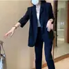 Traje de mujer talla grande con abertura en la espalda, moda de primavera estilo coreano, conjunto elegante casual de pantalones cropped de dos piezas, venta al por mayor transfronteriza