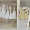 Pães de Creme LeEn para Bebês! Original 2026 Conjunto de Duas Peças Amarelo Estiloso com Renda para Meninas - Verão