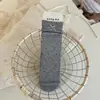 Meias felpudas de menina para o início da primavera "meias azul-acinzentadas nova versão coreana original de nicho para primavera e verão de meias felpudas"