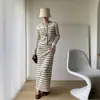 Conjunto de Dos Piezas Estilo Chic Francés Cárdigan de Punto de Manga Larga Rayado Ropa Exterior Falda Bodycon de Longitud Media Conjunto para Mujer