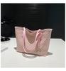 Bolso de mano informal para mujer, bolso de hombro de gran capacidad, primavera 2025.