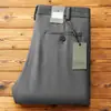 Pantalones Casuales de Poliéster tipo Lino de Lujo para Hombre, Cintura Media, Delgados de Verano Nuevo Estilo, Transpirables, Anti-Arrugas, Elásticos de Pierna Recta para Hombre