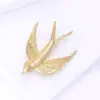 Nuevo Broche de Golondrina Esmaltado Mate Dorado de Venta Caliente Transfronteriza Europeo y Americano Moda Versátil Joyería Pin para Ropa de Mujer