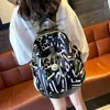 Mochila Grande com Estampa de Marca Tendência para Dropshipping 2025 Nova Moda Casual Mochila de Tecido Oxford Bolsa de Viagem