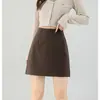 Falda de lana gris oscuro para mujer, mismo estilo que en Xiaohongshu, otoño/invierno 2026, falda corta de línea A de cintura alta adelgazante