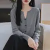 Diseño sentido hebilla de lazo 36 suéter fino de lana pura primavera y otoño dulce viento suave suéter de punto para mujer