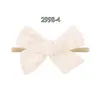 Bestseller transfronteiriço: Faixa de cabelo elástica de nylon fofa para bebê com laço grande, acessório de cabelo para bebê estampado em cor sólida 2998