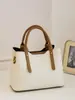 Bolsas de mano al por mayor transfronterizas, nuevos bolsos de hombro simples en bloques de color, bolsos versátiles y de moda para el uso diario, bolsas personalizadas