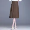 Elegante falda casual de estilo coreano de cintura alta en línea A, nuevo modelo de otoño 2026, falda midi plisada irregular texturizada