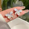 Brincos de Borboleta Estilo Coreano de Verão Yiwu Brincos Azuis Luxo Acessível Brincos de Cristal Femininos de Alta Qualidade Agulhas de Prata