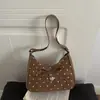 Textura exquisita lunares 2026 verano nuevo moda nicho diseño simple elegante versátil bolso de hombro bandolera