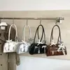 Bolsa de boliche moderna de grande capacidade para comércio exterior, nova bolsa de ombro simples com textura para o dia a dia