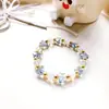 Venta al por mayor de fábrica Comercio exterior Estilo coreano Pulsera de cristal de mariposa Joyería de moda para mujer Pulsera de cristal Pulsera Fresca y dulce