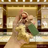 Venda Direta da Fábrica: Chaveiro Cavalo de Ouro Puro 999 do Ano do Cavalo, Pônei Dourado, Flor da Riqueza, Pingente de Celular, Charme de Bolsa