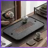 Bandeja de té de piedra de porcelana Wujin de imitación de lujo ligero para el hogar, juego de té, mesa de té pequeña, mesa de almacenamiento y drenaje de agua, mesa de remojo en seco, bandeja de té de piedra Wujin