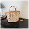 Bolsa pequena estampada retrô de alta qualidade transfronteiriça nova feminina elegante versátil estilo saco de balde bolsa de ombro único transversal moderna
