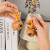 Chaveiro Criativo de Desenho Animado Capivara Voadora Boneca Casal Capivara Pingente Divertido para Mochila Pequeno Presente