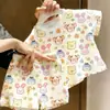 Conjunto de Camiseta de Manga Corta con Estampado Floral Lindo y Moderno de Dibujos Animados + Pantalones para Niños y Niñas, Nuevo Estilo Verano 2026