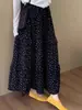 Falda vintage estampada floral negra para mujer, estilo europeo de verano, talla grande nueva, de cintura alta, falda de paraguas línea A adelgazante para cuerpo con forma de pera