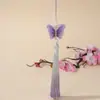 Bordado de mariposa en degradado dorado estilo nacional falda antigua con cara de caballo accesorios colgantes borla de púas hecha a mano joyería al por mayor
