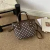 Bolso de Cubo Elegante Sencillo Personalizado Bolso Casual de Moda Nuevo Otoño 2026 Bolso de Hombro Cruzado Individual para Mujer de Alta Calidad