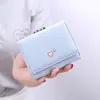 Carteira de celebridade da internet feminina estudante do ensino médio estilo coreano curta pequena carteira moda Mini Carteira de moedas tripla dobrável porta-cartões de uso duplo feminina