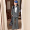 Conjunto de Ropa de Otoño para Niñas 2026 Nuevo Elegante de Moda Chaqueta Cárdigan Infantil Estilo Coreano Dobladillo con Volantes Pantalones de Campana Conjunto de Dos Piezas