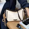 Bolso versátil para el día a día de moda transfronteriza para mujer, bolso de hombro cruzado de moda con textura de cuero encerado, bolso de axila de alta apariencia