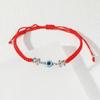Pulsera de Mano Tejida a Mano Ojo del Diablo Caliente Transfronteriza Ojo Azul Cuerda Roja Aleación Elefante Tortuga Palma