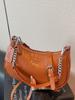 Bolso tipo baguette de nicho de alta gama para mujer 2025 Nuevo bolso de axila bolso de hombro moda femenina bolso de mano casual