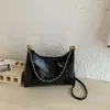 Comercio electrónico transfronterizo: Directo de la fábrica de origen, nueva colección 2026 de bolsos de cadena de alta gama con patrón de rombos, bolsos de hombro versátiles