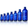Botella de vidrio graduada de 30 ml para aceites esenciales, botella gotero de vidrio azul de grado alimenticio, botella gotero de imitación madera para cosméticos