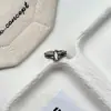 Nuevo anillo entrelazado de doble aro para mujer, retro, nicho, moderno, de alta gama, lujo ligero, simple, anillo abierto ajustable para mujer