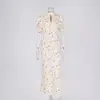 Estilo Novo Primavera e Verão 2026 Moda Europeia e Americana Transfronteiriça Vestido Floral para Mulheres, Vestido Longo de Alto Padrão com Decote em V Profundo e Temperamento Elegante
