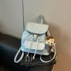 Mochila retrô de bolinhas casual transfronteiriça, novo modelo 2026, mochila versátil para o dia a dia e viagens, bolsa de mão e bolsa de ombro da moda