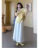Roupa de maternidade para o verão, conjunto doce e soltinho estiloso de estilo japonês com top babydoll de manga bufante e saia, conjunto de duas peças que rejuvenesce