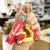 Nuevo Llavero de Dibujos Animados para Vehículo Eléctrico, Burro Eléctrico Pequeño Realista Colgante de Motocicleta de Silicona 3D, Regalo Multicolor al por Mayor