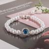 Pulsera de perlas aguamarina 2023 nuevo diseño de nicho de lujo ligero perla de imitación incrustada circón pulsera exquisita para mujeres