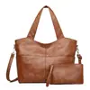 Bolsa de Mão Nova Versátil da Moda 2026 Nova Bolsa Feminina Grande Capacidade Nova Bolsa de Ombro Único Transversal Bolsa Tote Casual