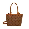 Bolso Pequeño 2025 Primavera y Verano Nuevo Versátil Moda Textura Nicho Bolso Cruzado Moda Femenina Bolso Cubo Femenino