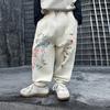 Pantalones de Algodón Elástico con Graffiti para Niños Otoño Primavera y Otoño Versión Coreana Pantalones Deportivos Elegantes Modernos Geniales para Niños Pantalones Largos Versátiles para Bebé
